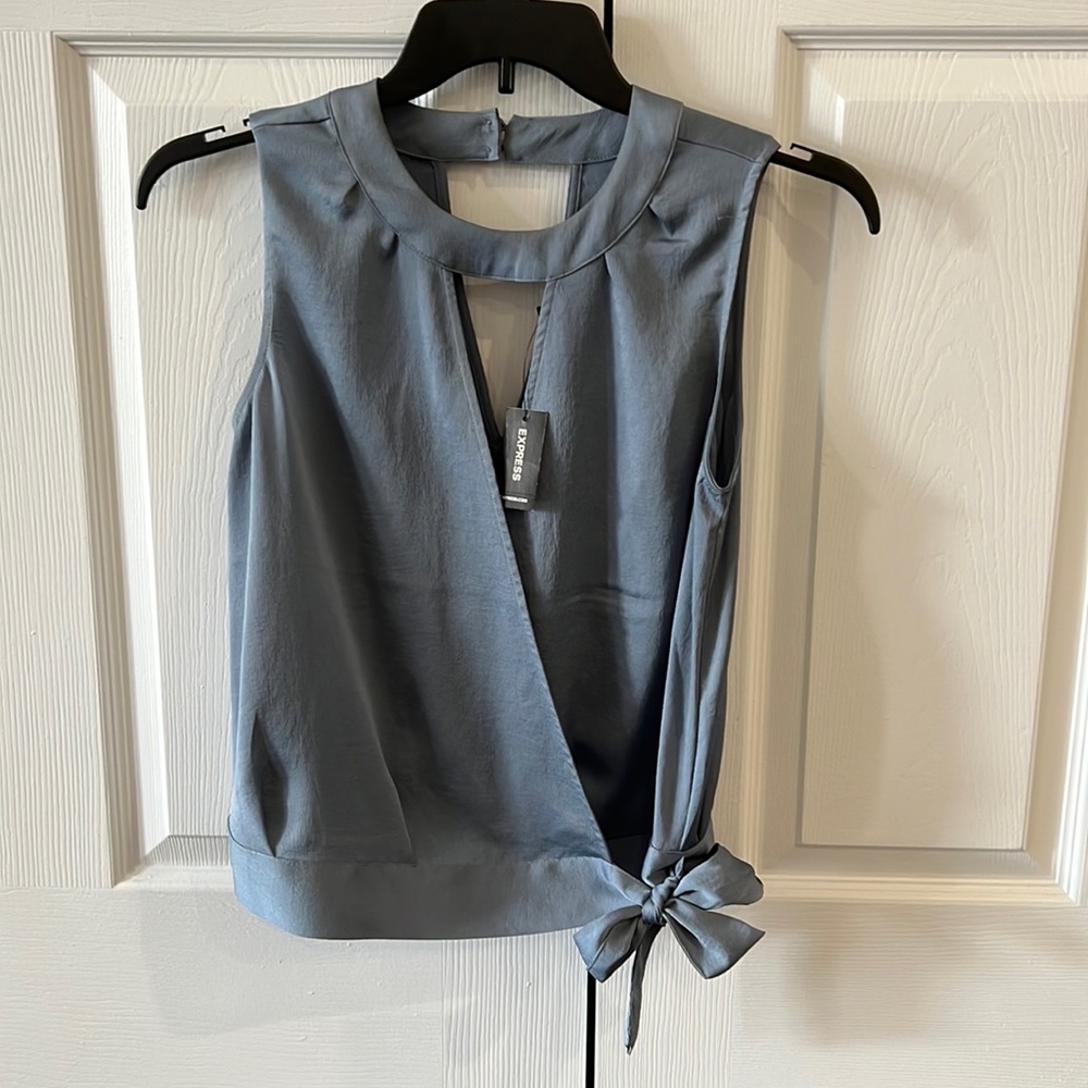 Brand New, tags on, sleeveless, key hole wrap around shirt